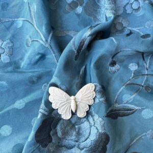 Broche mariposa color natural